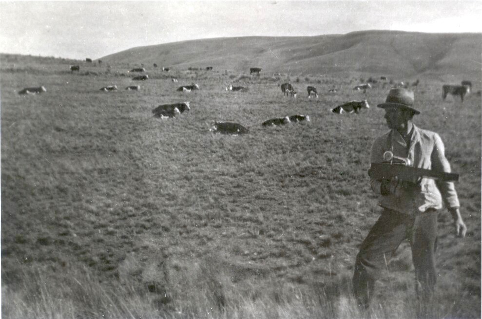 Charlie playing music to a mostly seated audience